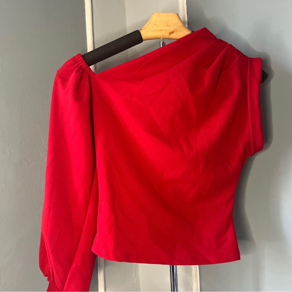 Red asymmetrical one shoulder blouse
